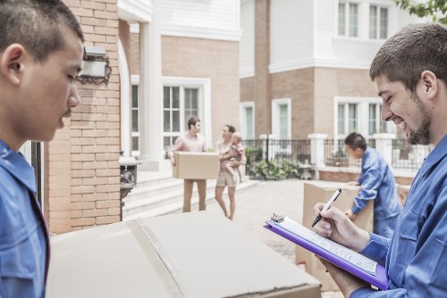 Mover protecting furniture during a Leytonstone house move