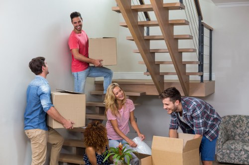 Commercial moving team helping a Leytonstone business relocate office furniture