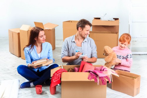 Office relocation planning in Leytonstone with packed boxes and office furniture