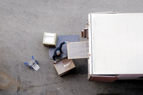 Packed office equipment and moving supplies prepared for a Leytonstone business move
