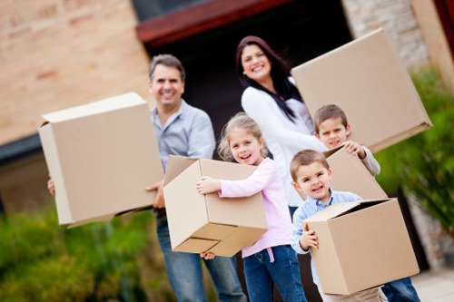 Loading furniture and boxes into a van for a Leytonstone home removal