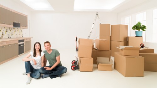 Professional packers organising household items in Leytonstone