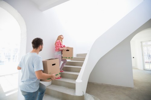 Packed boxes and moving supplies ready for a Leytonstone move