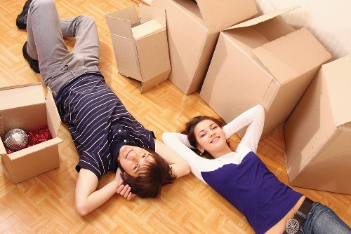 Local removals team handling furniture during a Leytonstone home move