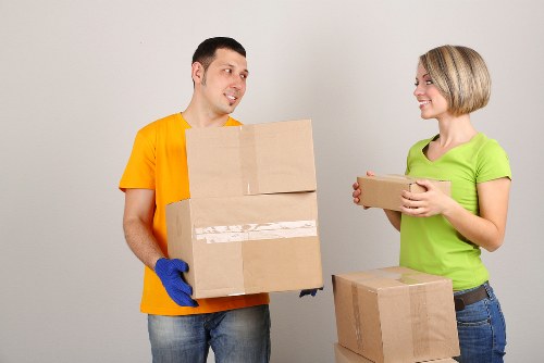 Careful loading of household items into a van
